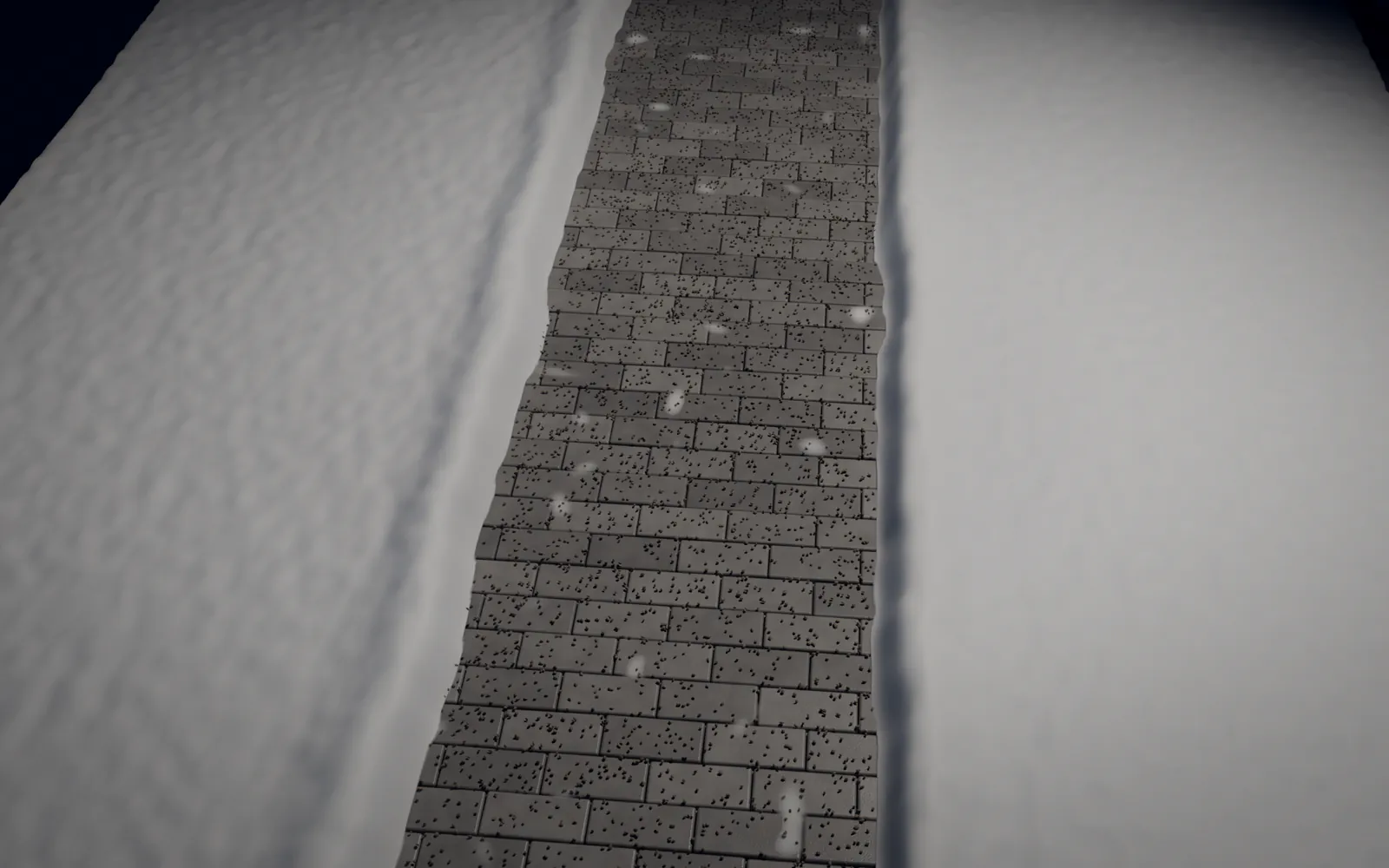 Pflasterweg unter Laternenlicht, eine geräumte Bahn durch den Schnee, Streugut am Rand.