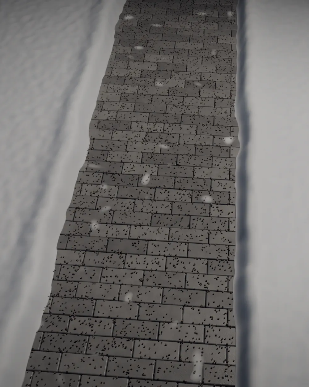 Pflasterweg unter Laternenlicht, eine geräumte Bahn durch den Schnee, Streugut am Rand.
